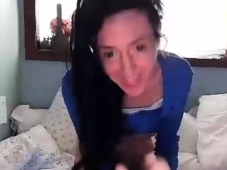 Amateur young brunette enjoys dildo on solo masturbation